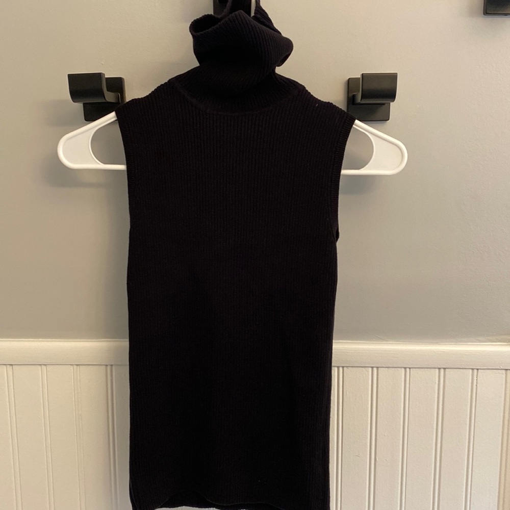 Never work black turtleneck sleeveless sweater